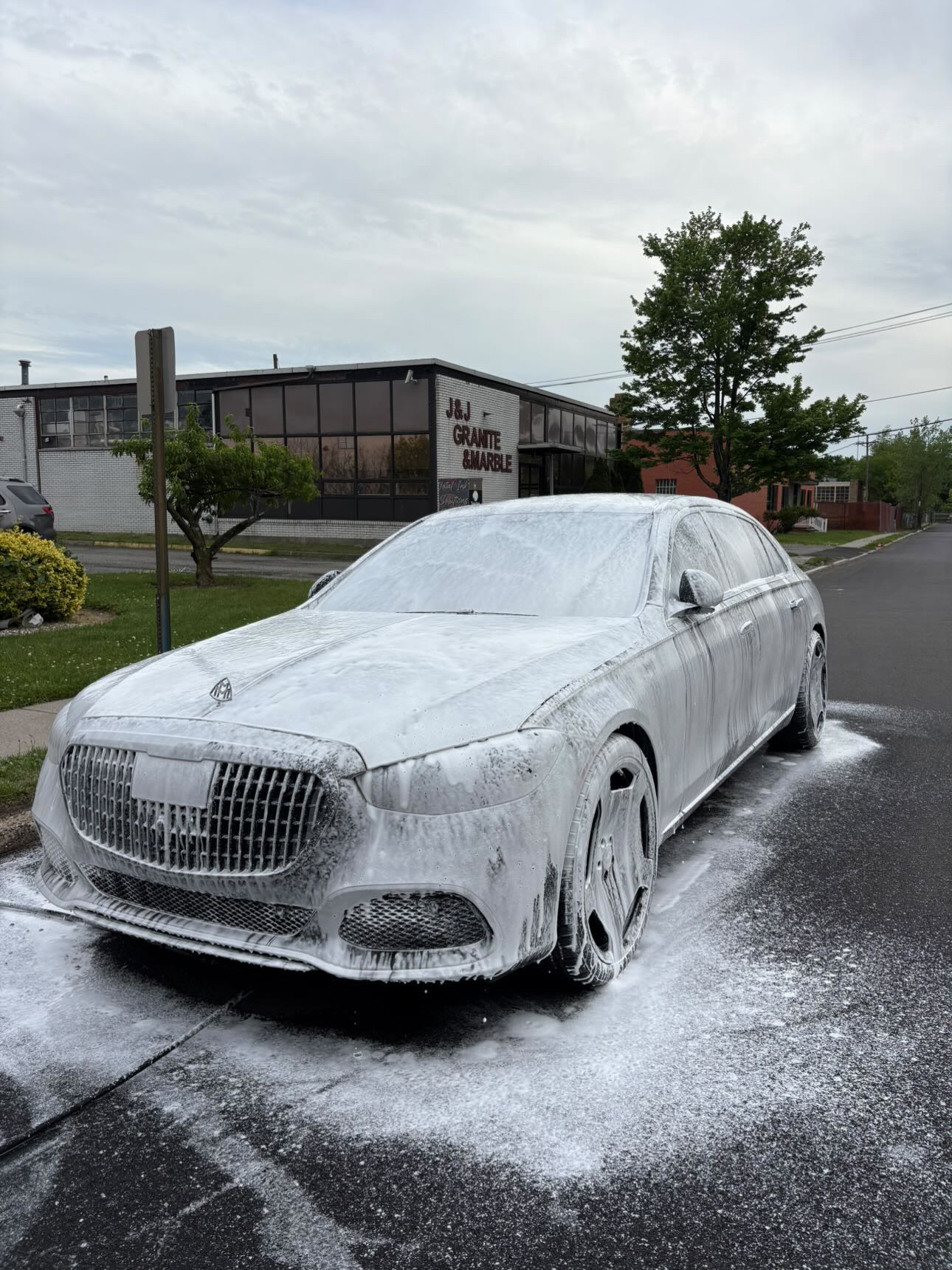 Mercedes-Maybach S-Class blanketed in snow foam during pre-wash
