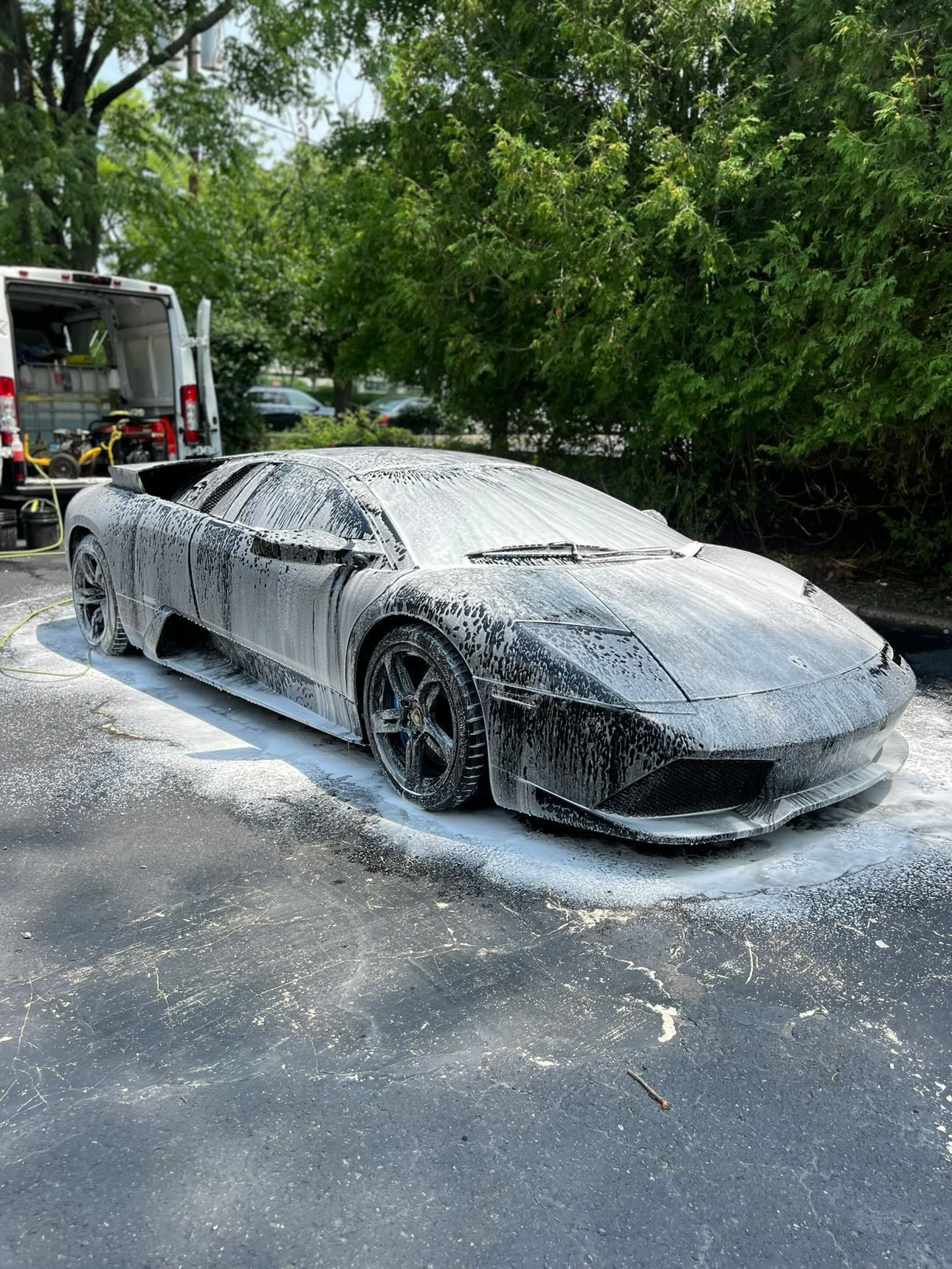 Lamborghini Murciélago covered in foam during decontamination wash