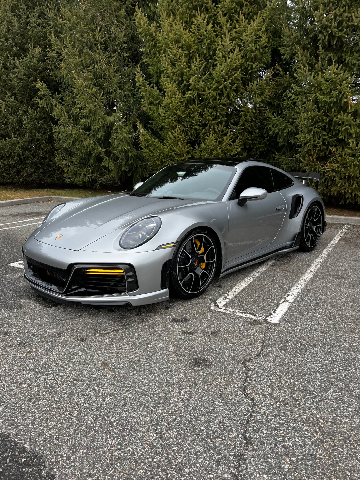 Silver Porsche 911 Turbo S kept showroom-ready under the Full Detail & Maintenance monthly plan